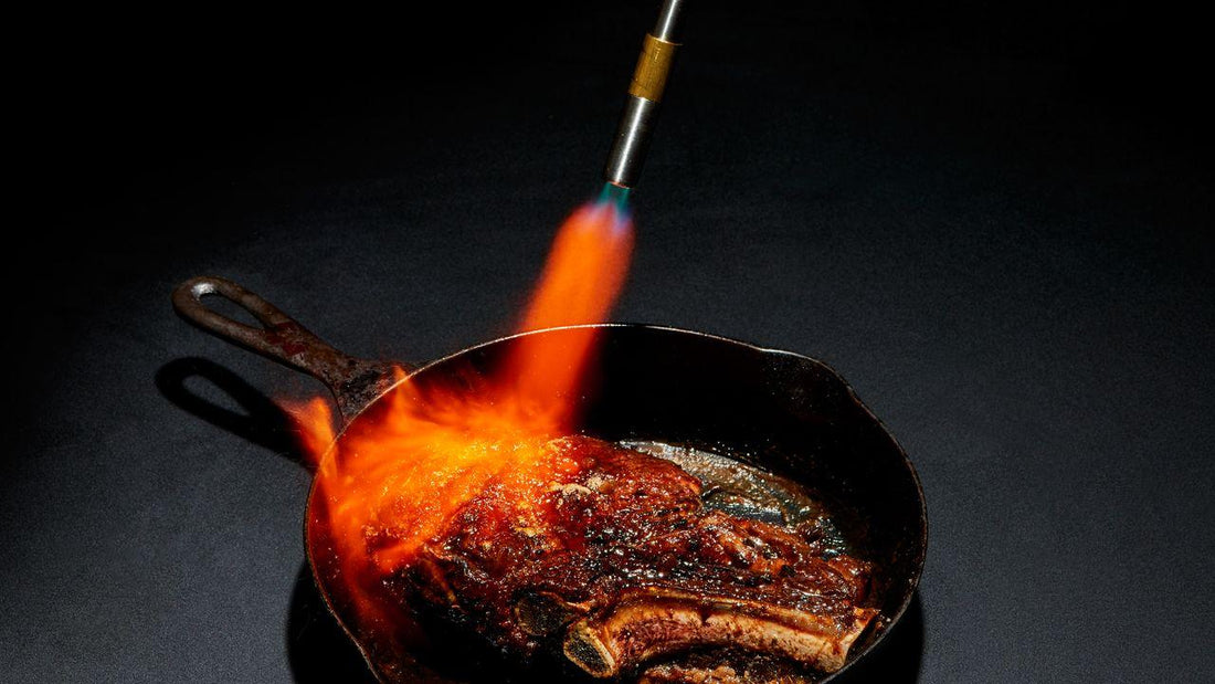 blow torch vs sear pan steak crust comparison with dramatic lighting