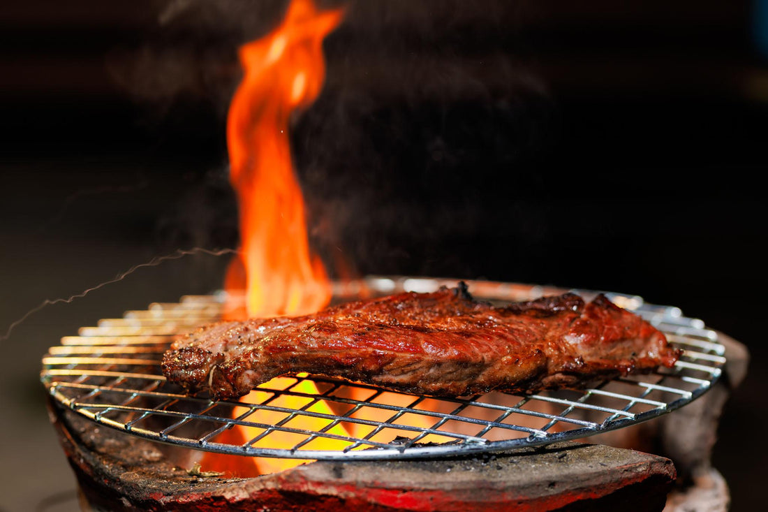 best blow torch for steak searing juicy ribeye with blue flame close up